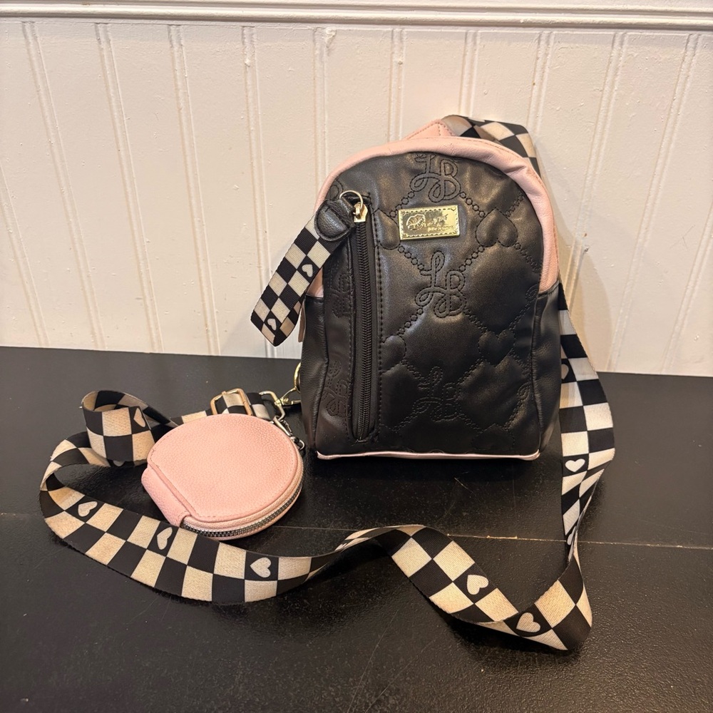 Betsey Johnson Cross body quilted
Hearted Backpack Purse